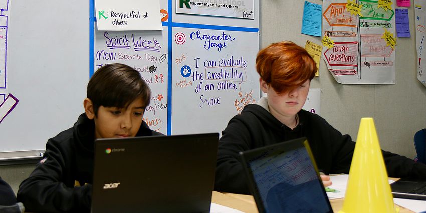 students on laptops