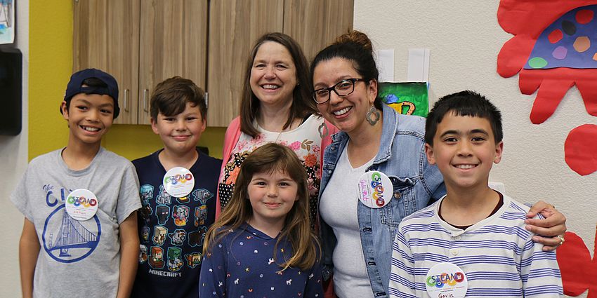 happy students with teacher